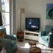 <br>moderne woonkamer met grootbeeld TV