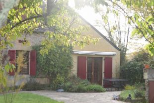 Maison Laura achter 