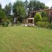 Achterzijde tuin <br>Tuin volledig omheind met ook een overdekt terras