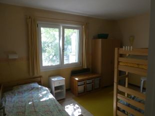 Slaapkamer met drie bedden huis