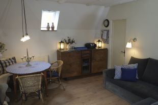 DE woonkamer gezien vanuit de deuropening