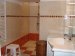 Gîte de Lascabanes, badkamer <br>Smaakvolle badkamer met douche à l'italienne, wastafel, toilet en wasmachine
