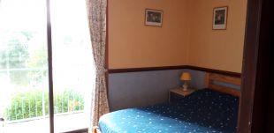 Masterbedroom met balkon