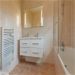 Badkamer slaapkamer 1 <br>Twee wastafels, ligbad met douche en wc