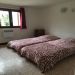 slaapkamer 2 benedenverdieping <br>slaapkamer 2 met 2 eenpersoonsbedden en babybed