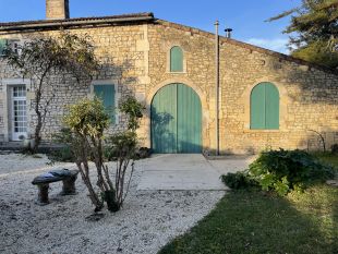 Entrance through the arch doors at the back.