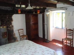 Slaapkamer naast keuken