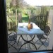 terras uitkijkend op de tuin