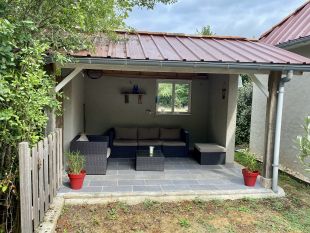 Tuinkamer/terras bij het zwembad
