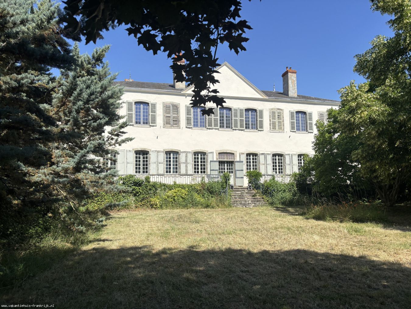 achterkant huis met ingang