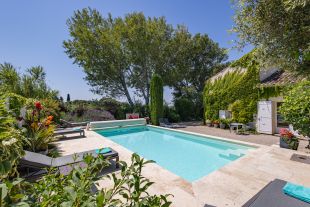 Heated pool with electronic cover