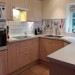 Ruim geoutilleerde keuken. - Met inductie, vaatwasser, oven, magnetron, nespresso, koelvriescombinatie en ruime selectie potten en pannen