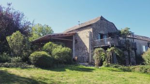 Achterkant gite met balkon/terras