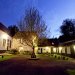 Looking across the courtyard as twilight descends on the gitês. <br>Looking across the courtyard as twilight descends on the gitês.