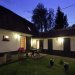 The Petit Gîte and outdoor seating area as twilight descends. <br>The Petit Gîte and outdoor seating area as twilight descends.