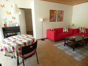 Gezellige en fleurige woonkamer