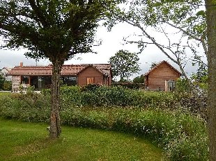 (Vakantie) koopwoning: Cerilly -Chalet van 110 m? aan de rand van het dorpje vlakbij het bos van Tron?ais. te koop in Allier (Frankrijk).
