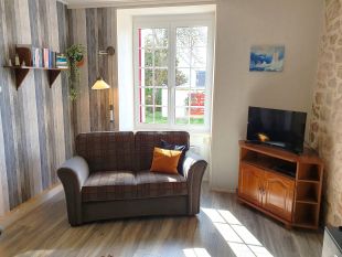 De woonkamer genomen vanuit een andere hoek