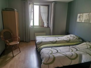 slaapkamer met 2 1-persoonsbedden