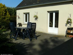 het terras met tuinmeubilair