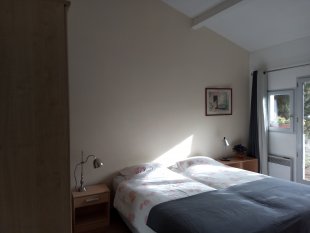 Zonnige slaapkamer studio Onida