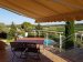 Terrasse centrale et vue panoramique sur la nature environnante <br>Coin repas sur la terrasse principale surplombant la piscine