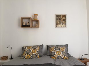 slaapkamer met 2 boxspring bedden