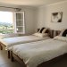 Bedroom one with twin beds and stunning views too! 