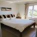 The master bedroom including en-suite shower room and stunning sea views! 