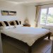 The master bedroom including en-suite shower room and stunning sea views!