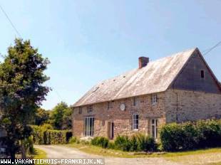 Vakantiehuis: Bocage Maison. Middeleeuws Normandisch Lang Huis, gelegen in prachtige aangelegde tuinen in rustige landelijke omgeving. te huur in Manche (Frankrijk)