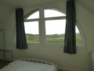 slaapkamer voor twee, met zicht op zee