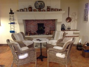 cosy kitchen seating area and decorative fireplace